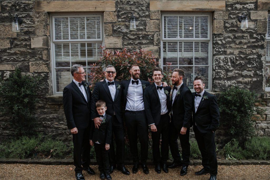 laughing groomsmen