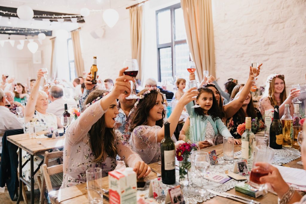 cheering wedding guests